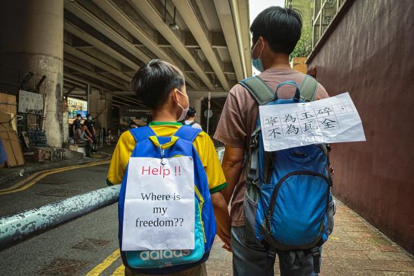 Si un Hongkongais réclame un système démocratique plus fort dans la ville et a une histoire liée à une organisation pro-démocratie aux États-Unis, il peut être accusé d’association avec des « ennemis étrangers ». (Image : Studio Incendo / flickr / CC BY 2.0 )